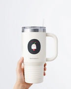 Hand holding a tumbler displaying Nuts & Lemons Co. diecut sticker featuring a cute ghost pepper dressed as a ghostie  with the phrase “ghost pepper”