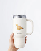 Hand holding a tumbler displaying a Nuts & Lemons Co. diecut sticker featuring a Dino nug with tail dipped in sauce with the phrase “just the tip”