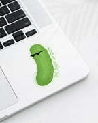 Laptop displaying a Nuts & Lemons Co. diecut sticker featuring a dill pickle with shades with the phrase “kind of a big dill”