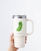 Hand holding a tumbler displaying Nuts & Lemons Co. diecut sticker featuring a dill pickle with shades with the phrase “kind of a big dill”