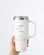 Hand holding a tumbler displaying Nuts & Lemons Co. diecut sticker featuring a melted snowman with the phrase “I’m fine, just having melt down"