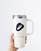 A hand holding a white tumbler with a Nuts & Lemons Co. diecut sticker on it featuring an ufo with an alien and octopus with the phrase “Two Peas On a Pod”