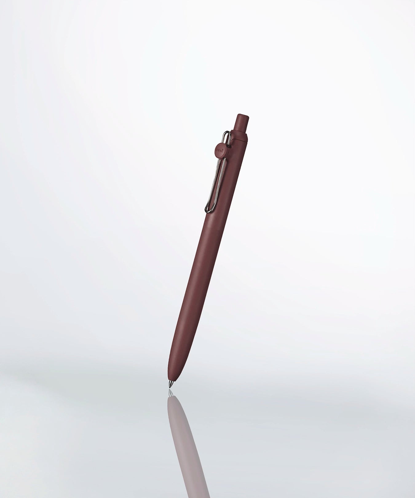 a uniball zento pen in color chocolate