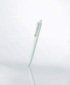 a uniball zento pen in color seafoam