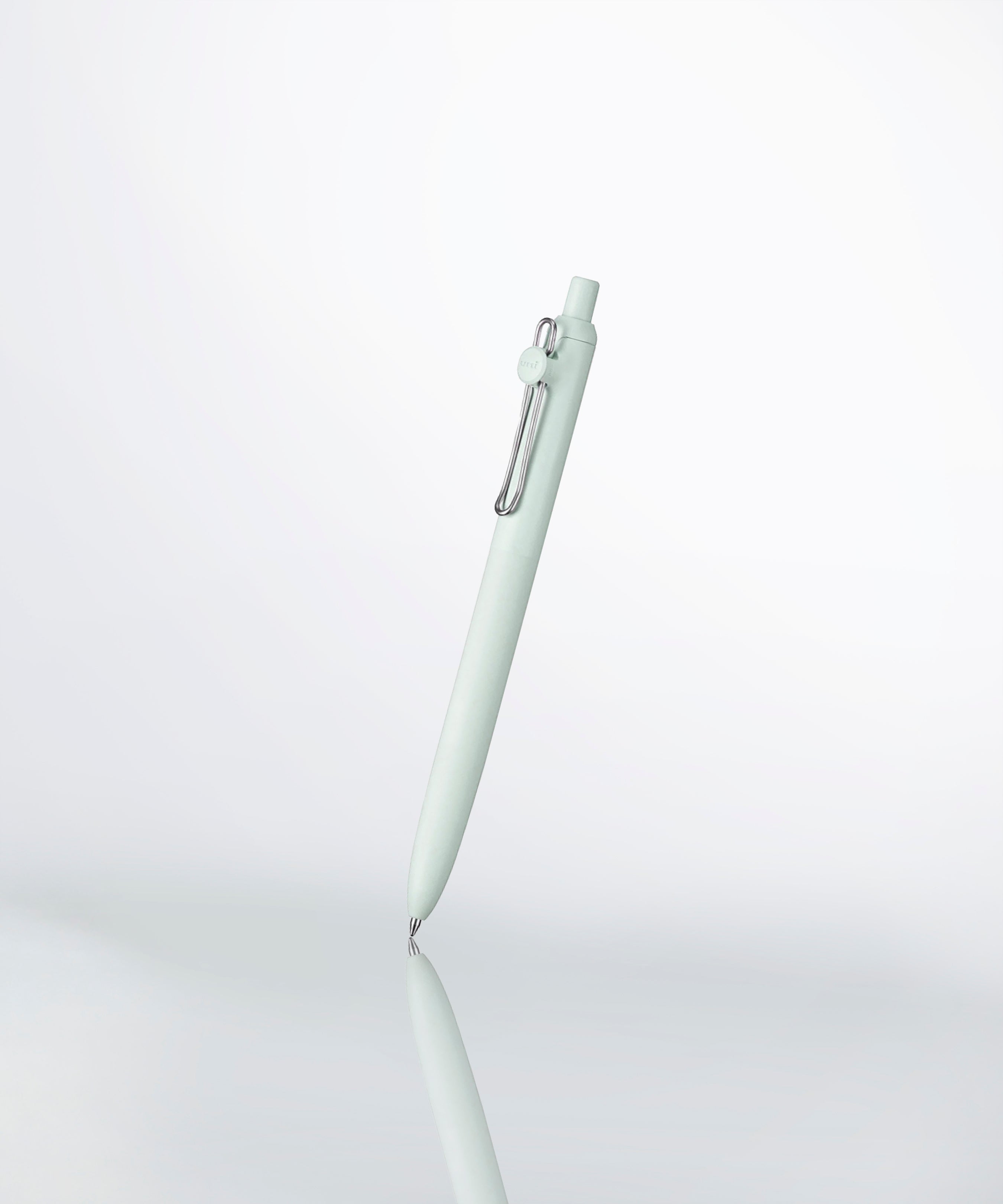 a uniball zento pen in color seafoam